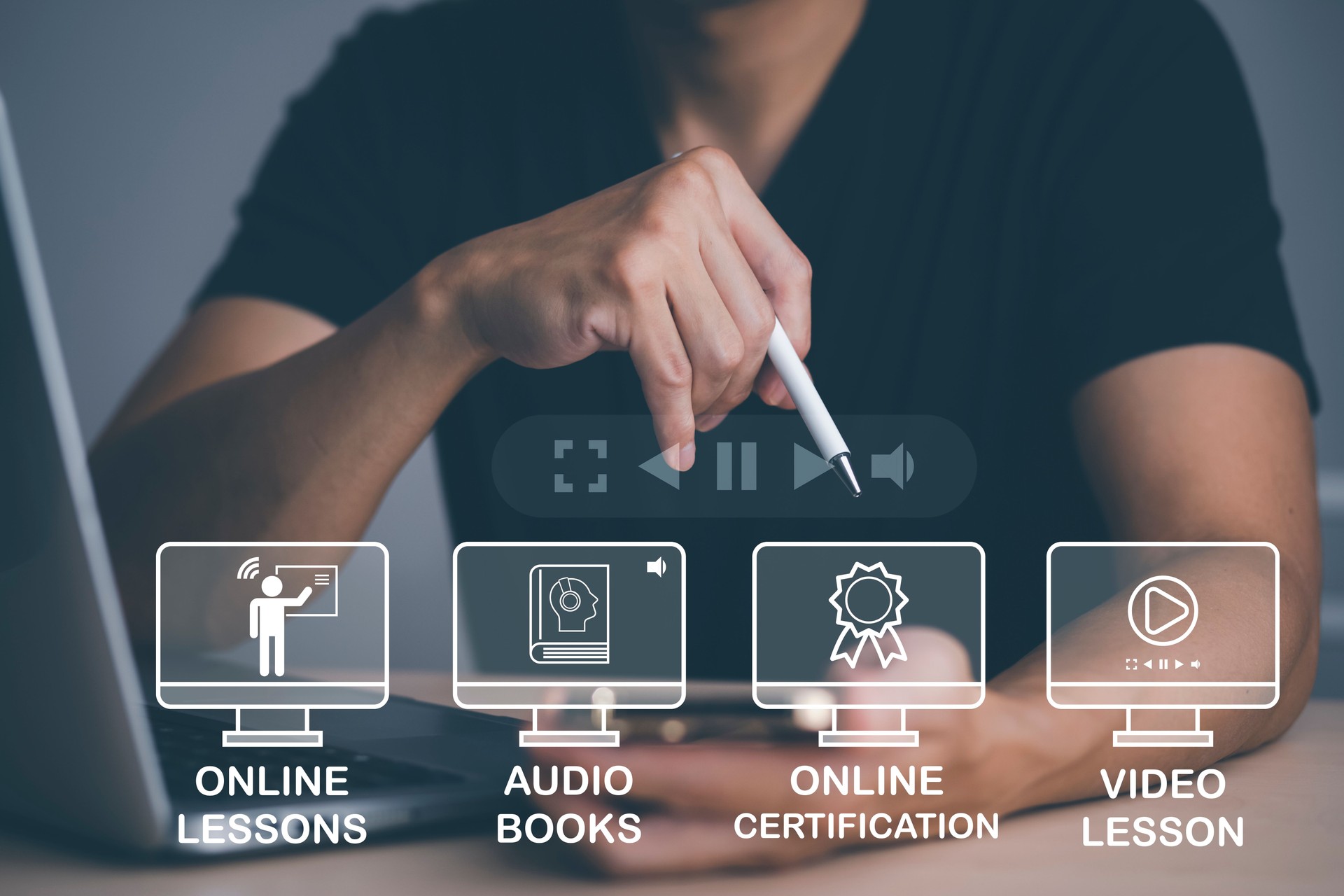 Concept E-learning education,Man using laptop with Online Education icon on virtual screen. video internet lessons and online webinar, online lessons on a digital screen.Education internet Technology.